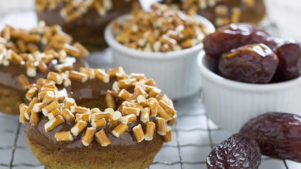 vegan plain doughnut with salted caramel glaze and pretzels