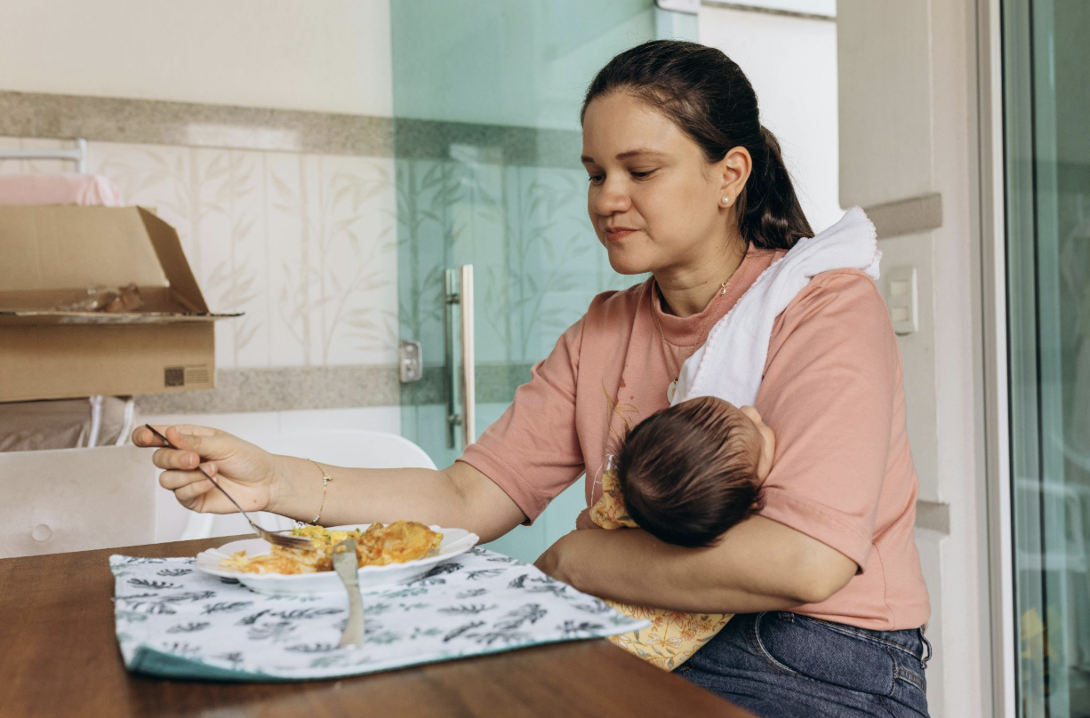 mom with baby eating