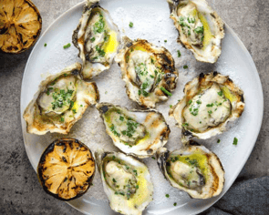 Grilled Oysters with White Wine Butter Sauce
