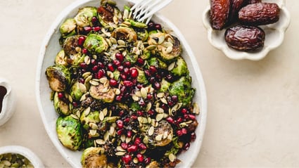 Maple and Date Balsamic Brussels with Pomegranate Seeds